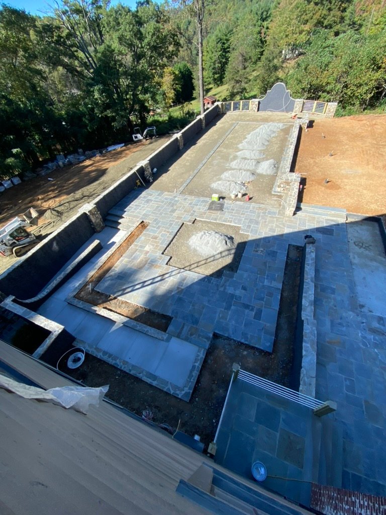 Grand Lawn Terrace construction — bluestone patio & stone retaining walls taking shape