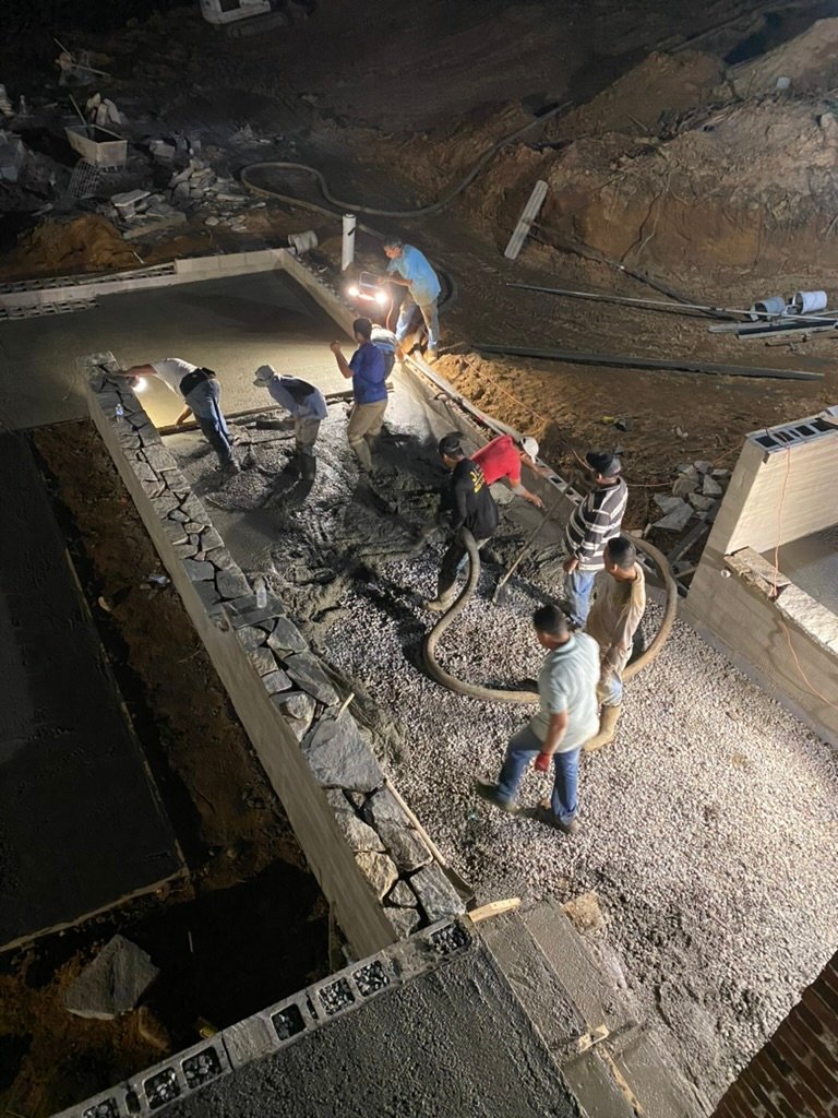 Night pour — crew laying concrete for the Grand Lawn Terrace foundation