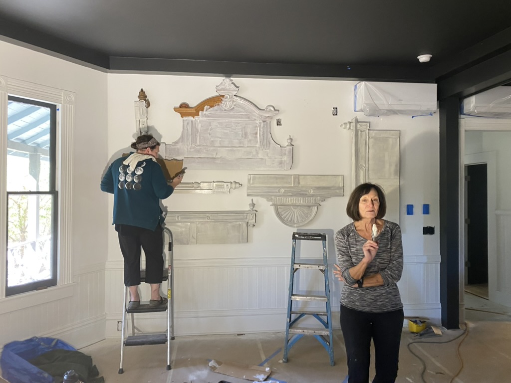 Interior renovation — antique headboard wall art taking shape
