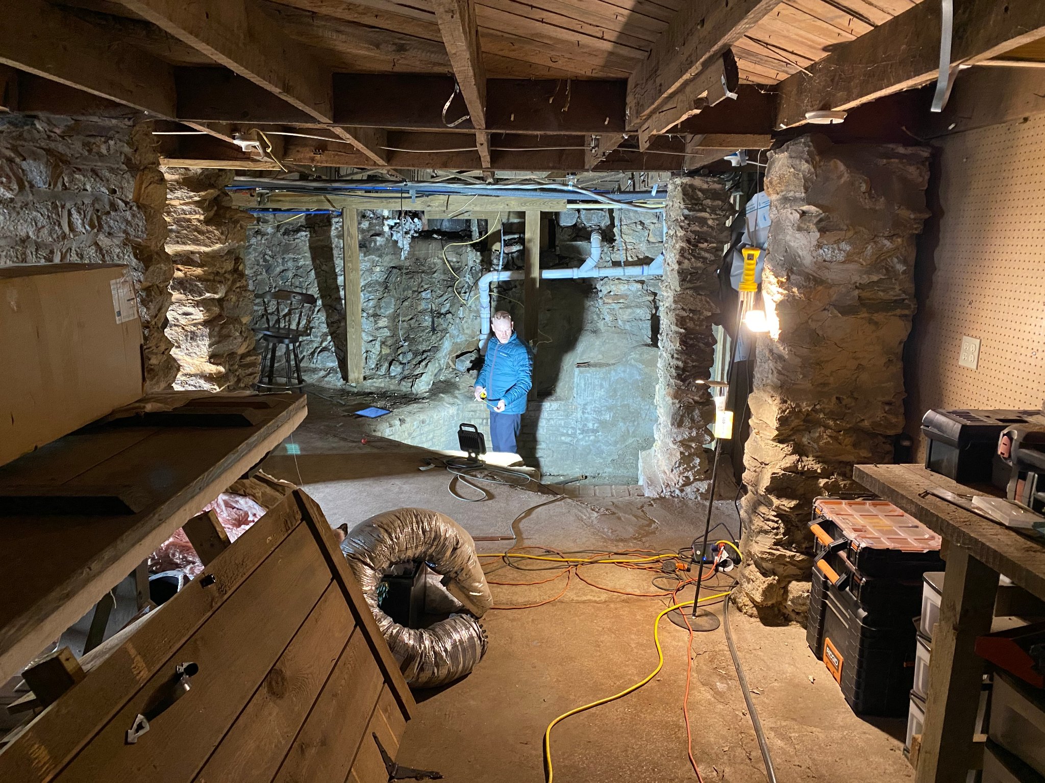 Wine Cellar excavation — original stone walls & exposed earth