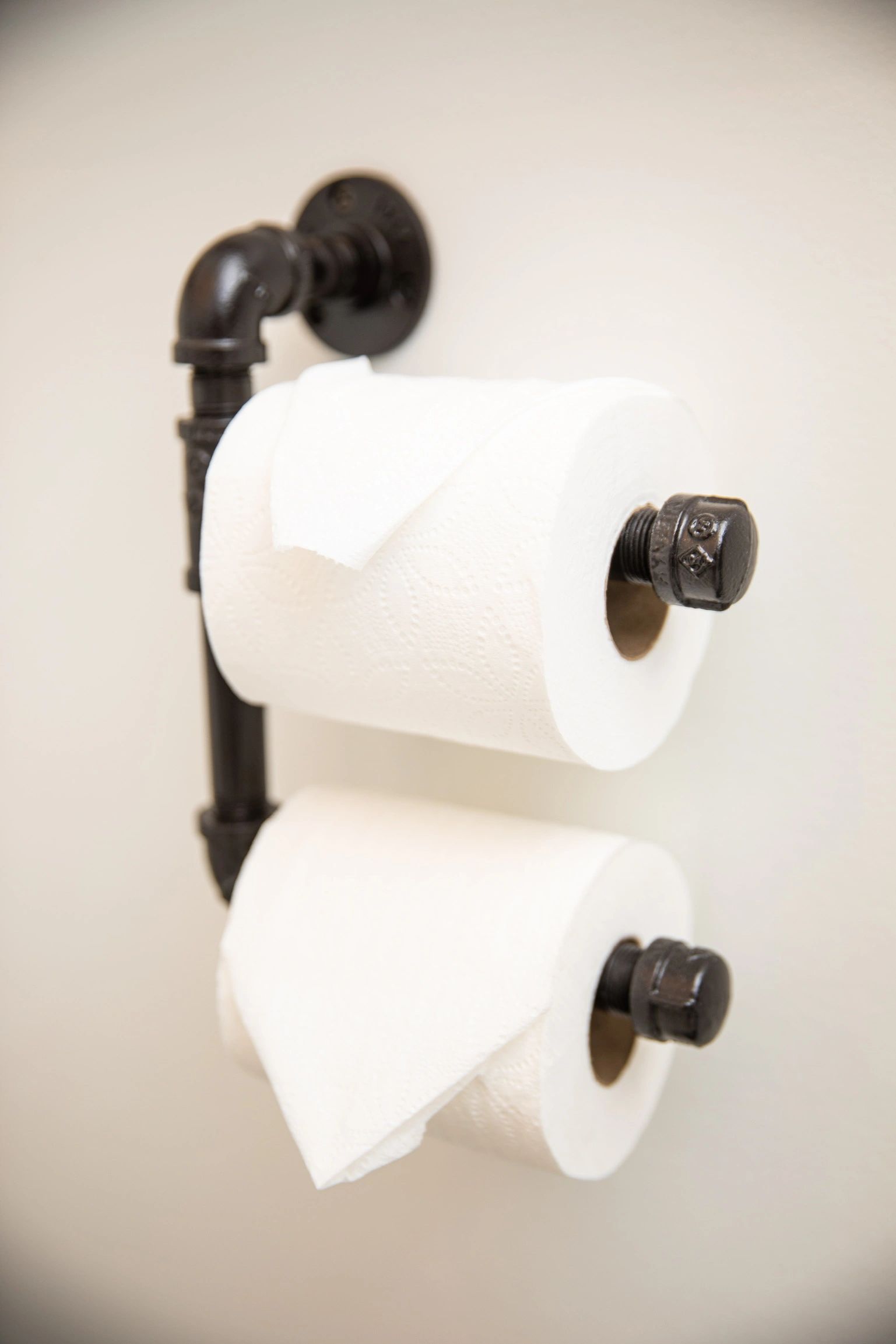Double toilet paper holder made from black metal pipes
